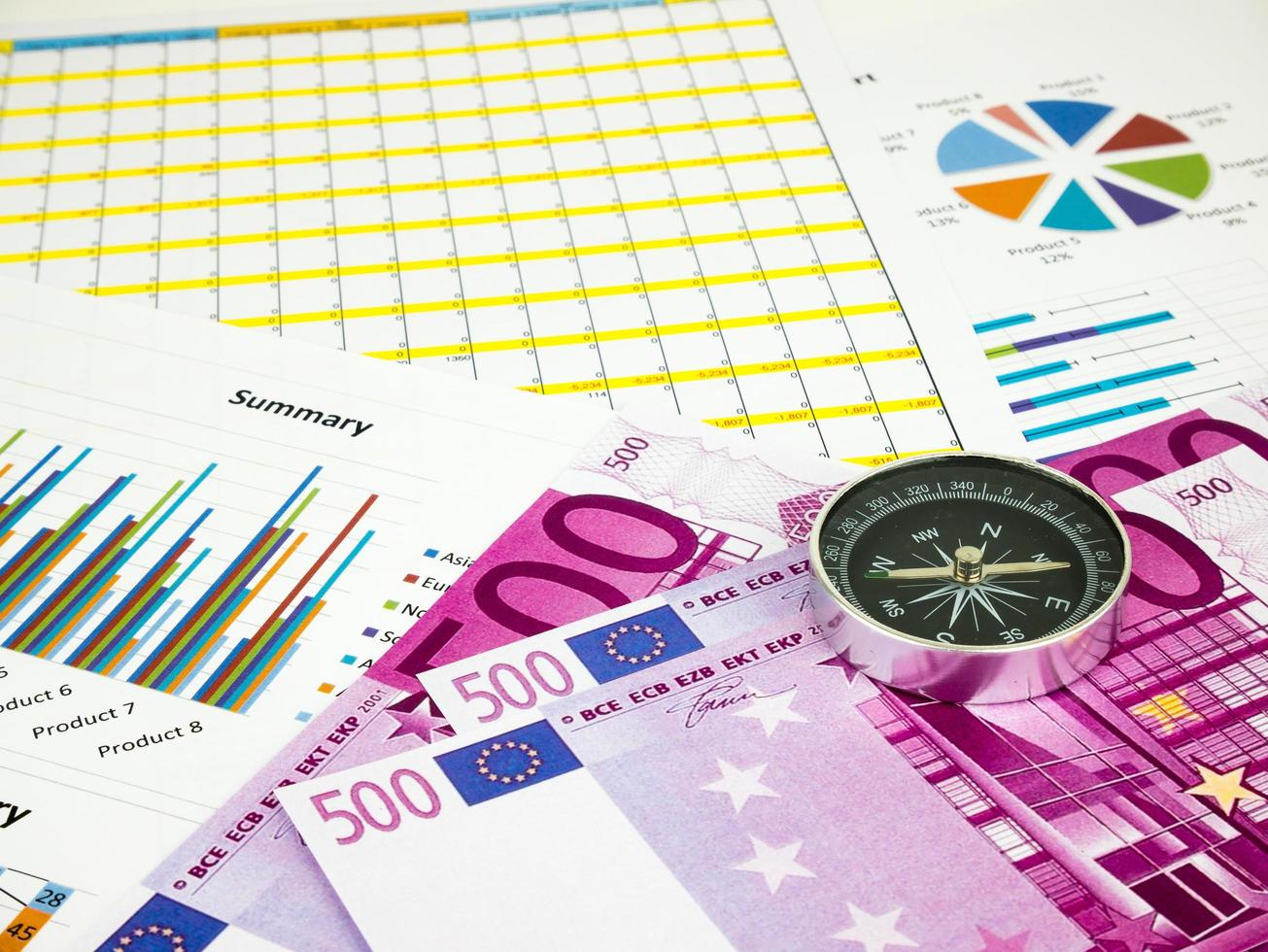 Five hundred 500 Euro bills banknotes with Compass, Business background photo