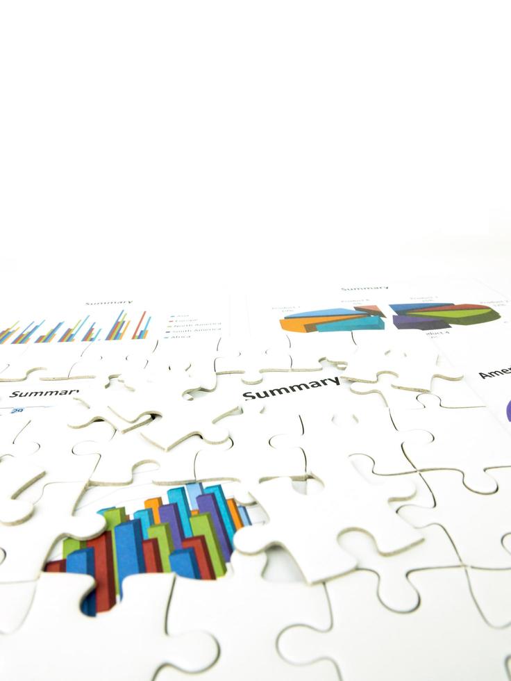 Missing jigsaw puzzle pieces on Graph Calculations background, Key for Business economic success concept photo