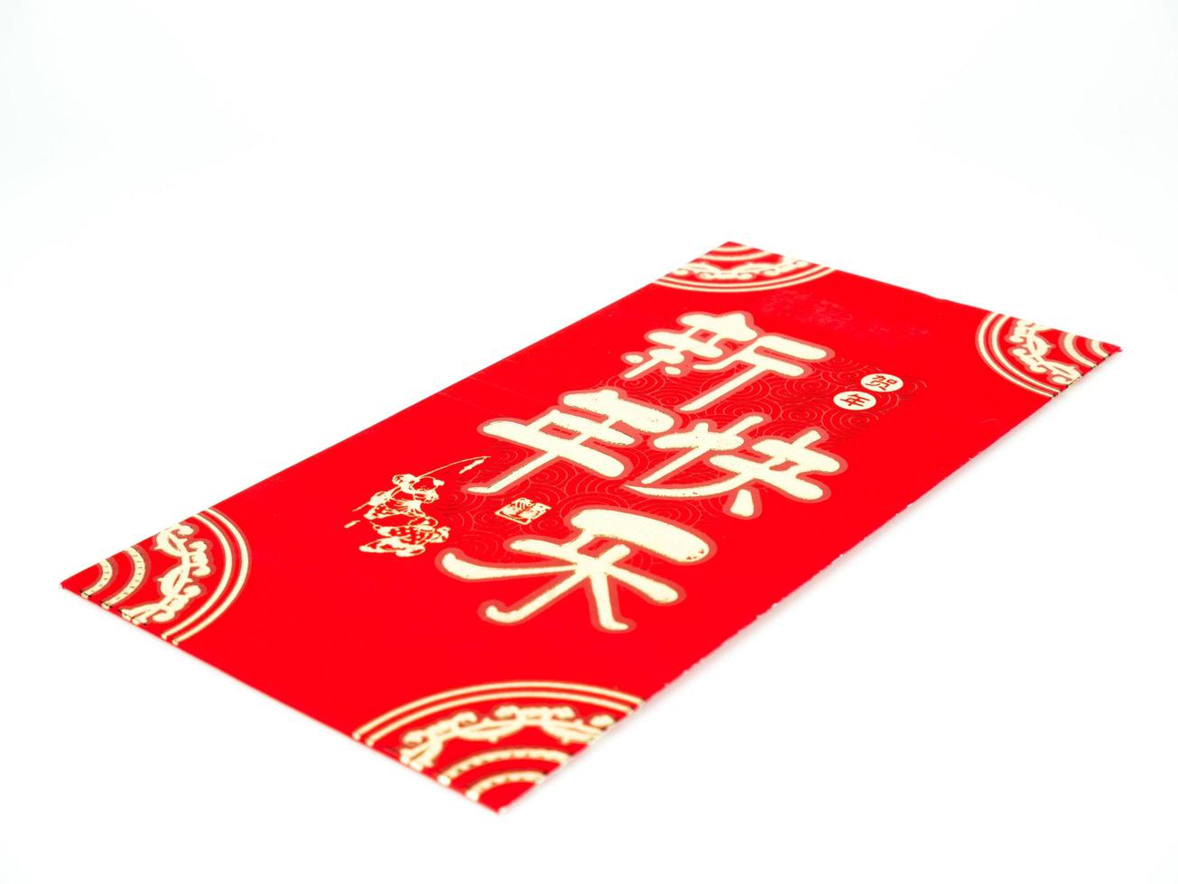 Red envelope isolated on white background for gift Chinese New Year. Chinese text on envelope meaning Happy Chinese New Year photo