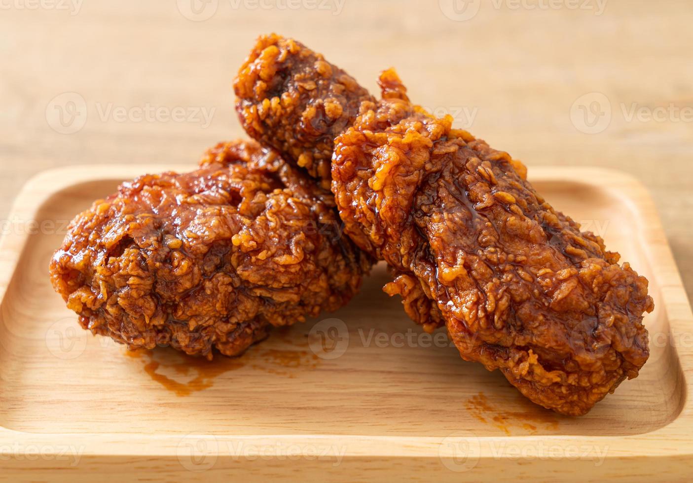 fried chicken with spicy Korean sauce photo