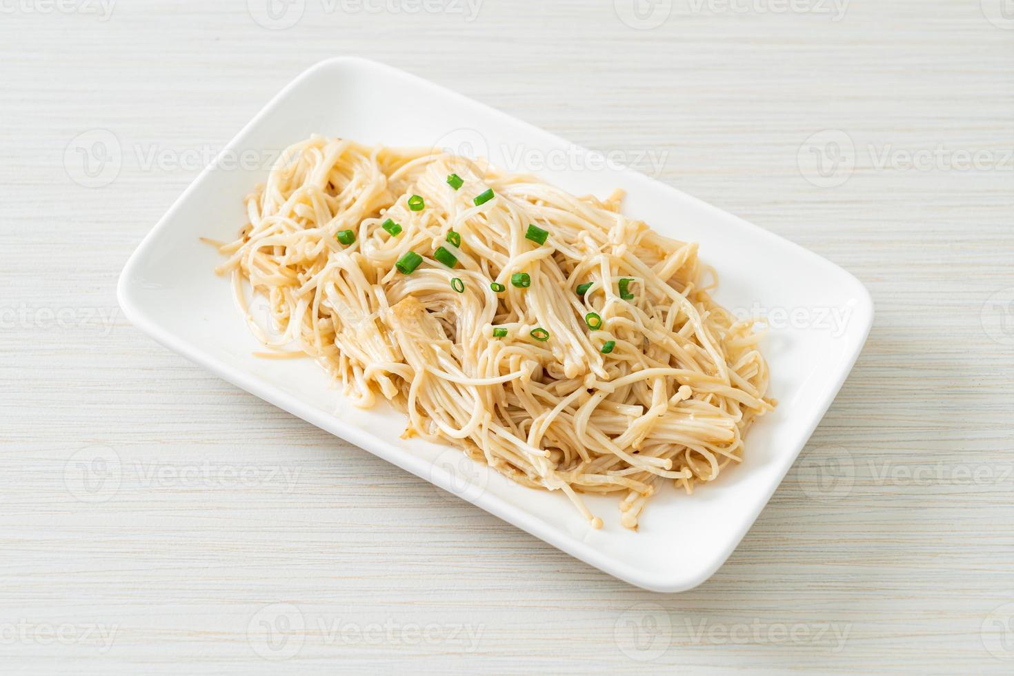 stir-fried golden needle mushroom with butter photo