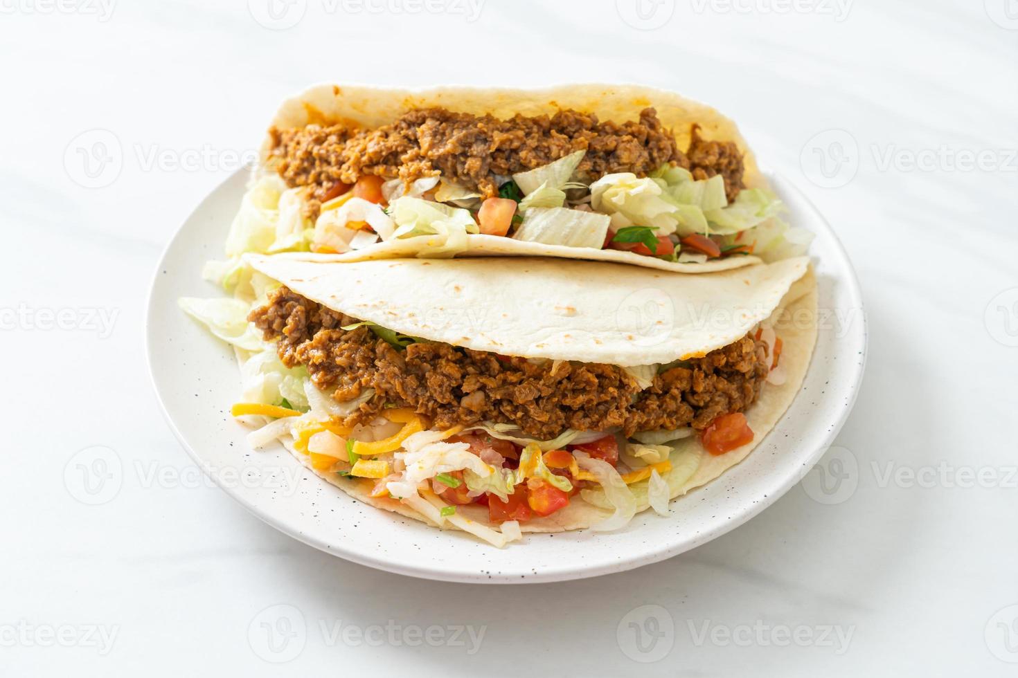 Mexican tacos with minced chicken photo