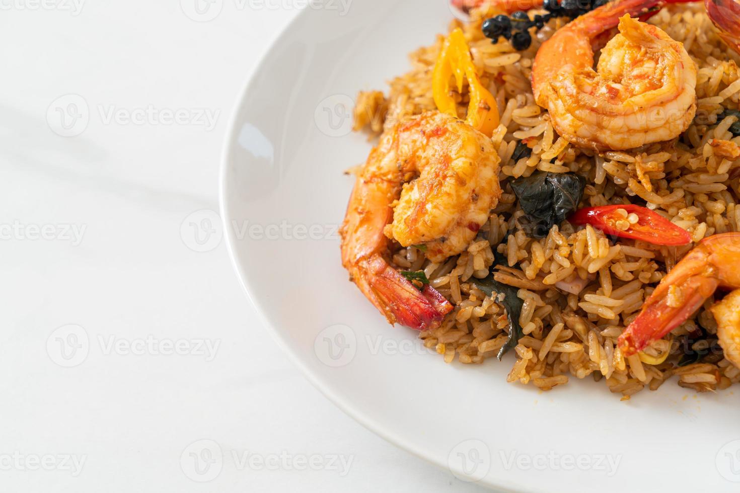 shrimps fried rice with herbs and spices photo