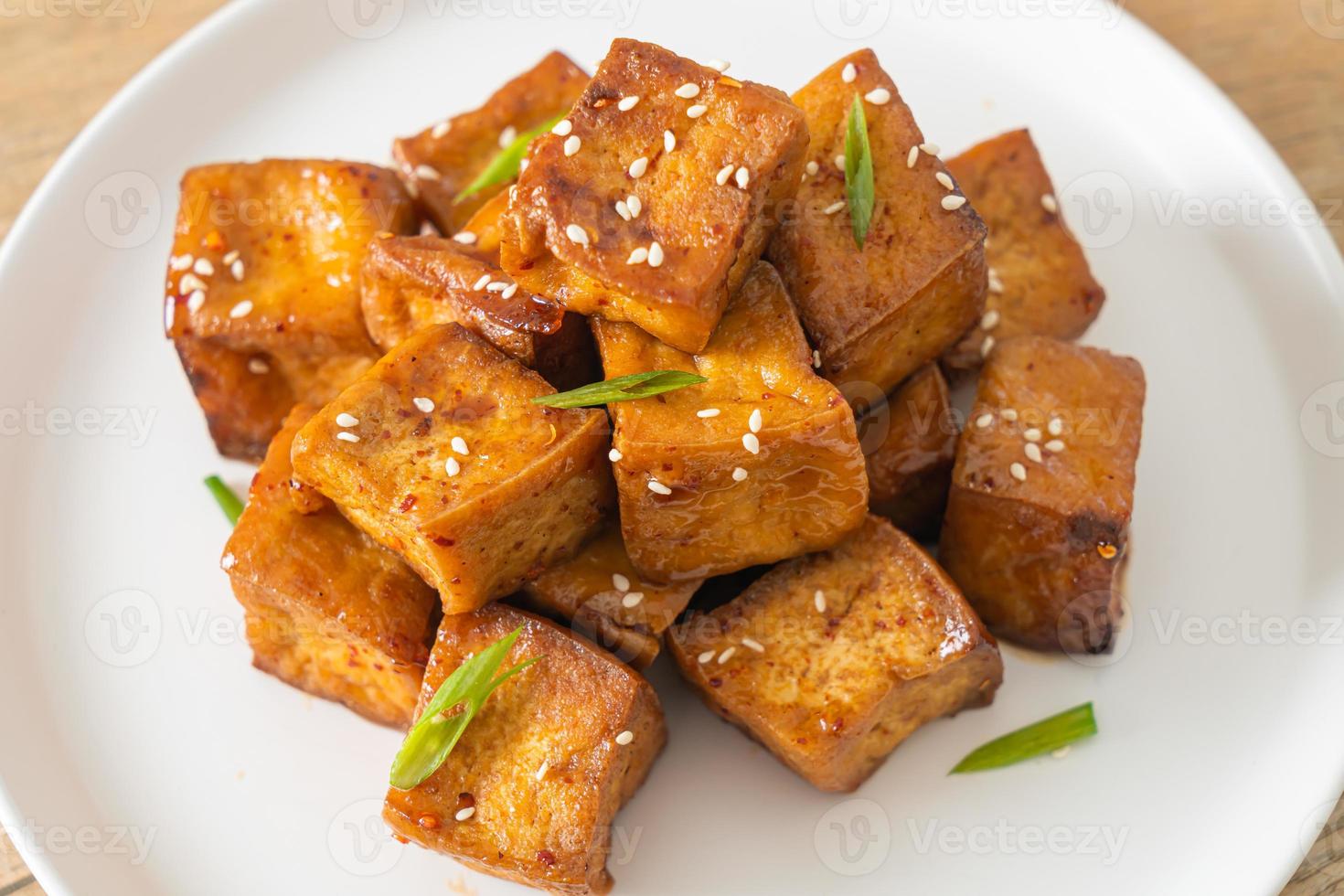 fried tofu with white sesame and teriyaki sauce photo