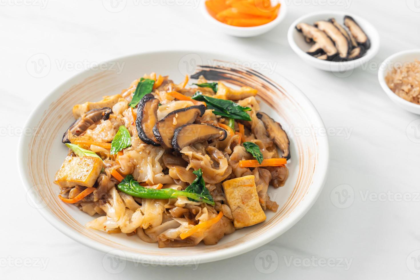 stir-fried noodles with tofu and vegetables photo