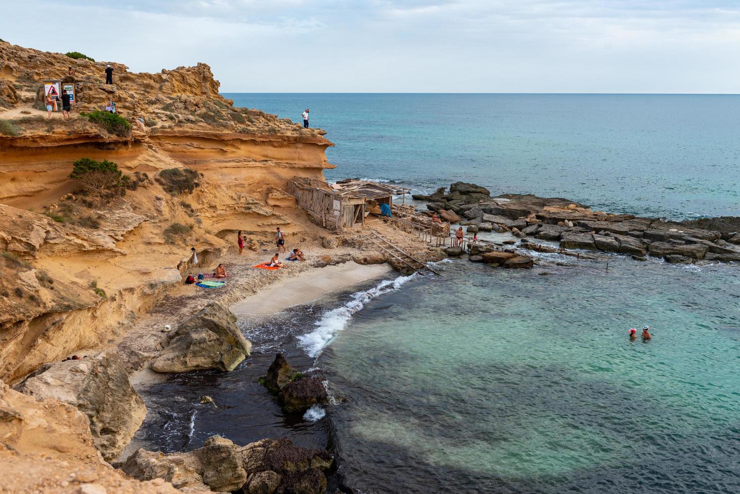 People in autumn in Calo d es Mort on the island of Formentera in Spain in summer 2021. photo