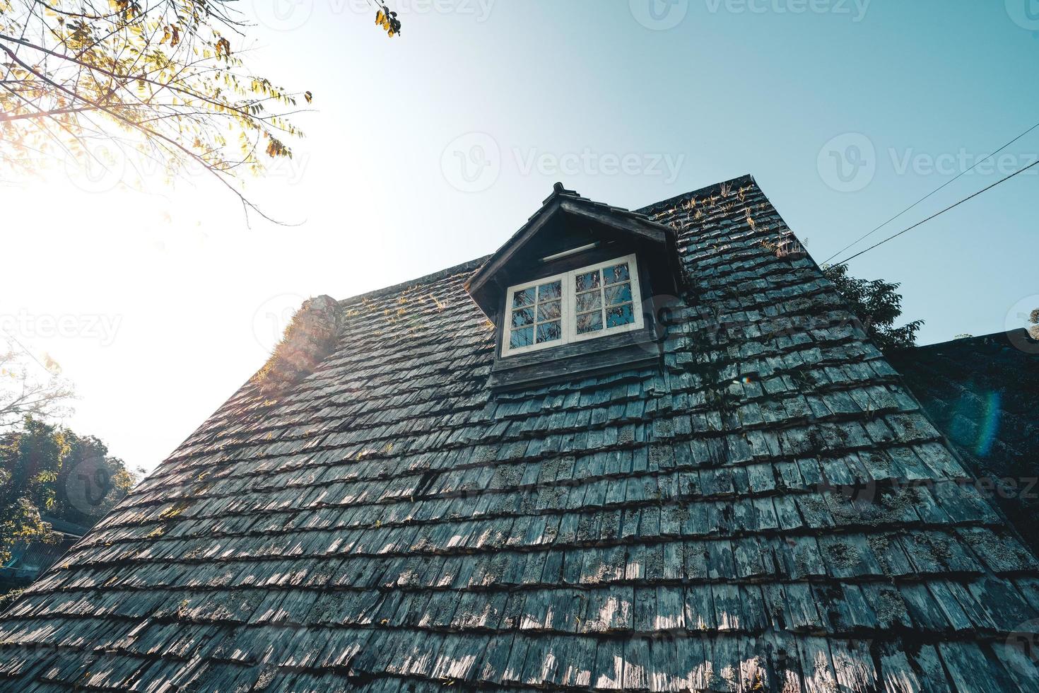 A-Frame cabin in summer morning photo