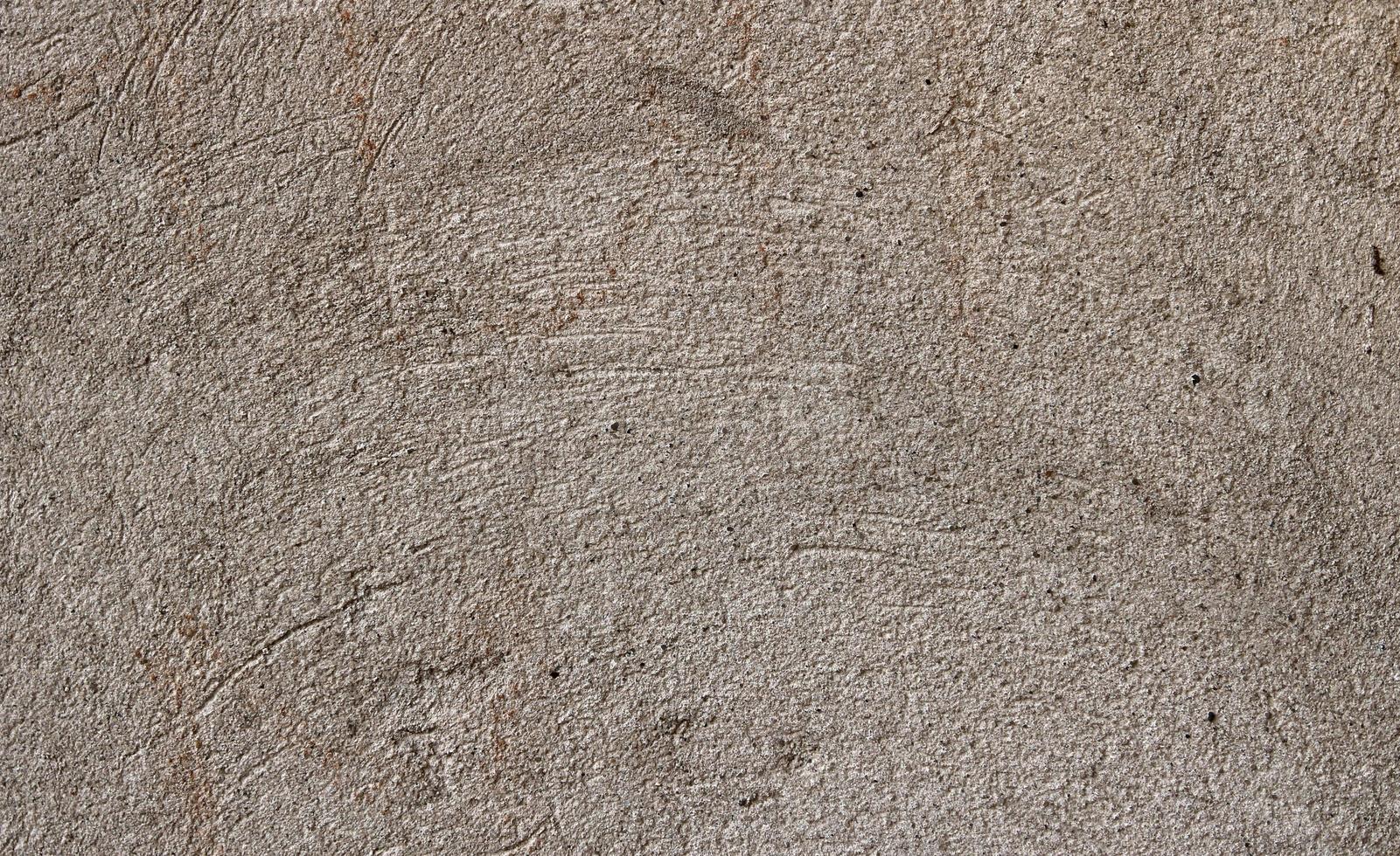 Old scratched outer wall decoration, warm gray color. texture photo