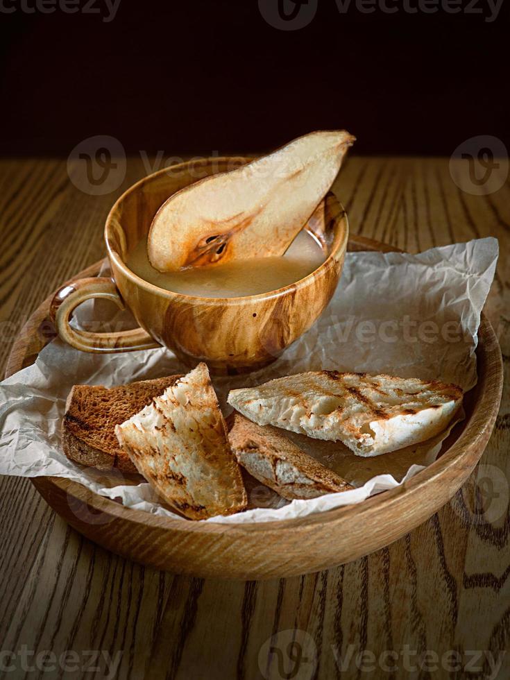 aperitif - jelly pate with pita and decorated with pear photo