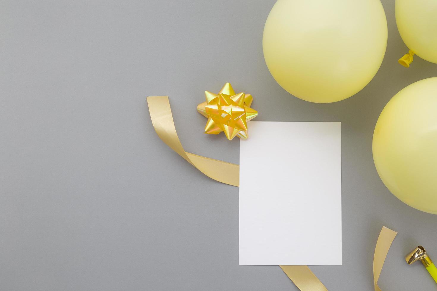 Happy birthday background, Flat lay party decoration with flyer invitation card on pastel grey background photo