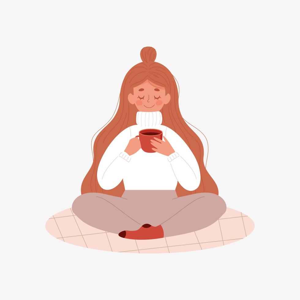 Woman in a warm sweater drinks coffee tea hot chocolate while sitting on the carpet vector