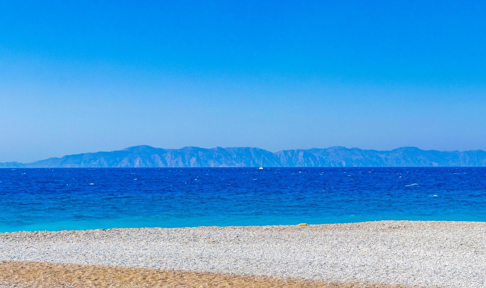 Elli beach landscape Rhodes Greece turquoise water and Turkey view. photo