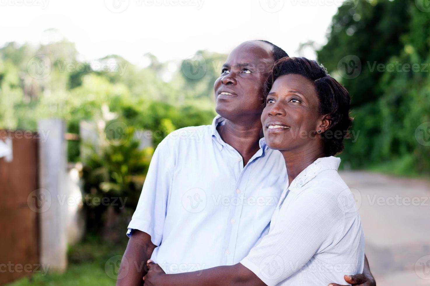 young couple embracing on campaign. photo