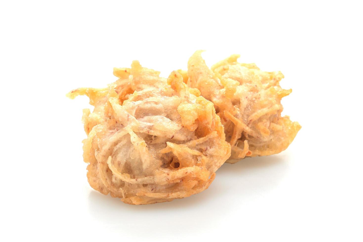 Fried taro isolated on white background - vegan and vegetarian food style photo