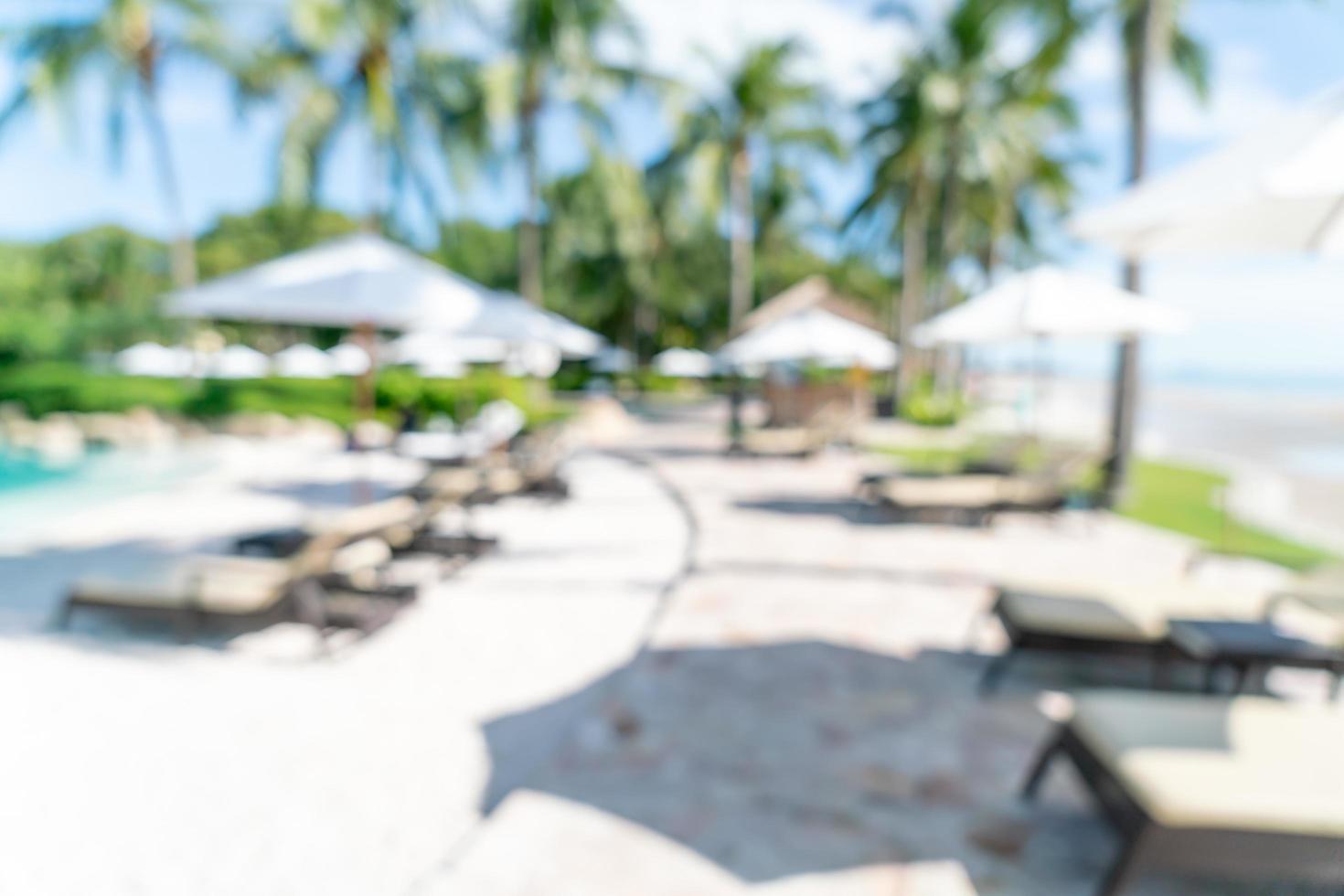 Abstract blur bed pool around swimming pool in luxury hotel resort for background - Holiday and vacation concept photo