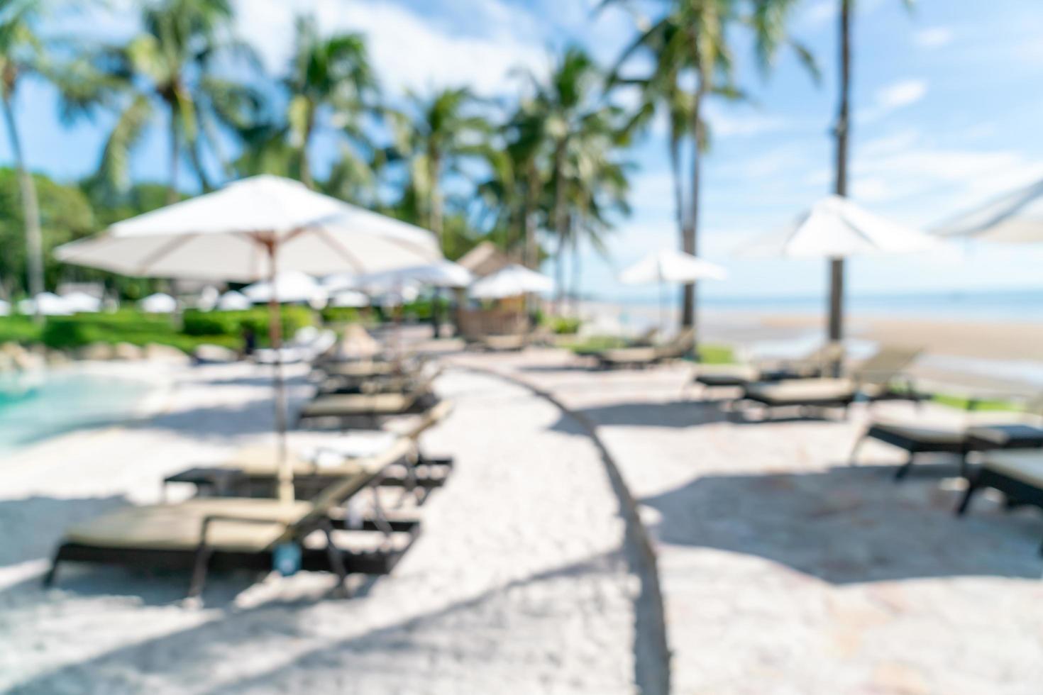 Abstract blur bed pool around swimming pool in luxury hotel resort for background - Holiday and vacation concept photo