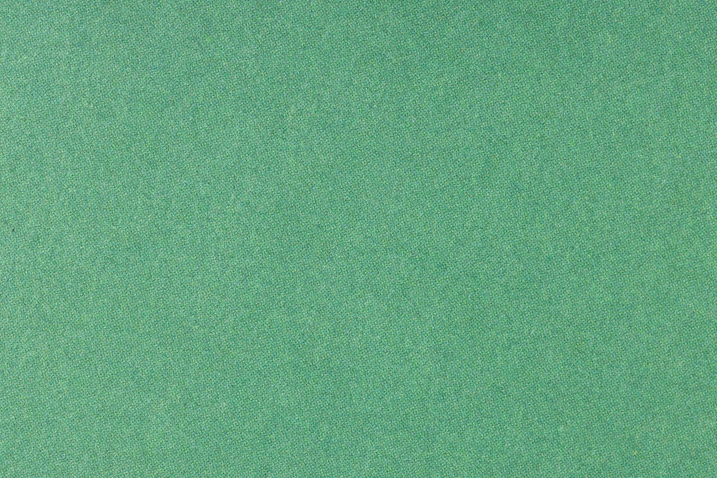 Green offset printed paper background texture. Macro close up. Full frame photo