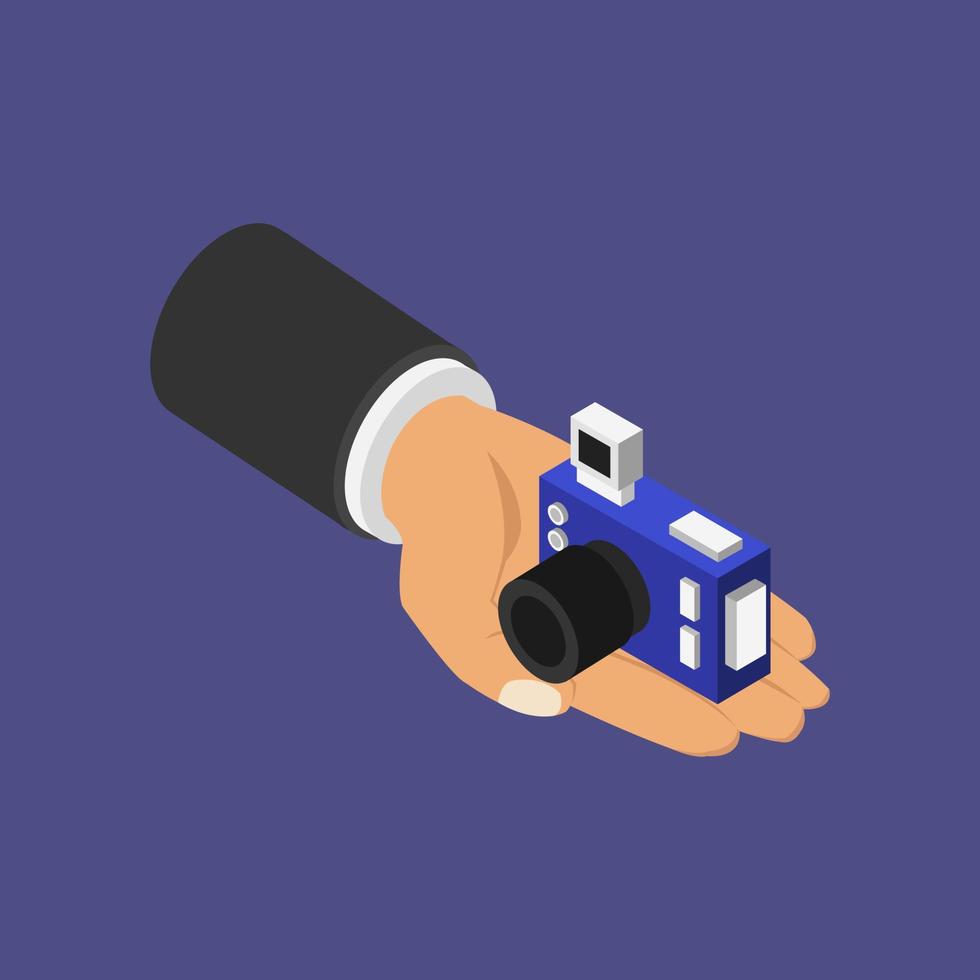 Camera in hand isometric vector