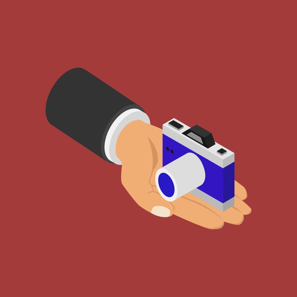 Camera in hand isometric vector