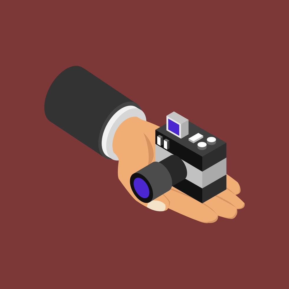 Camera in hand isometric vector