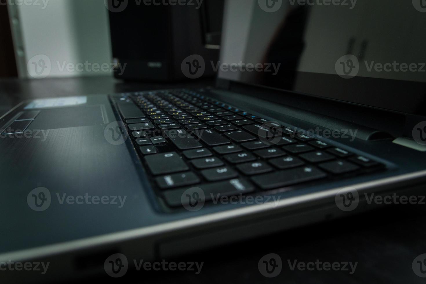Keyboard with letters in Hebrew and English photo