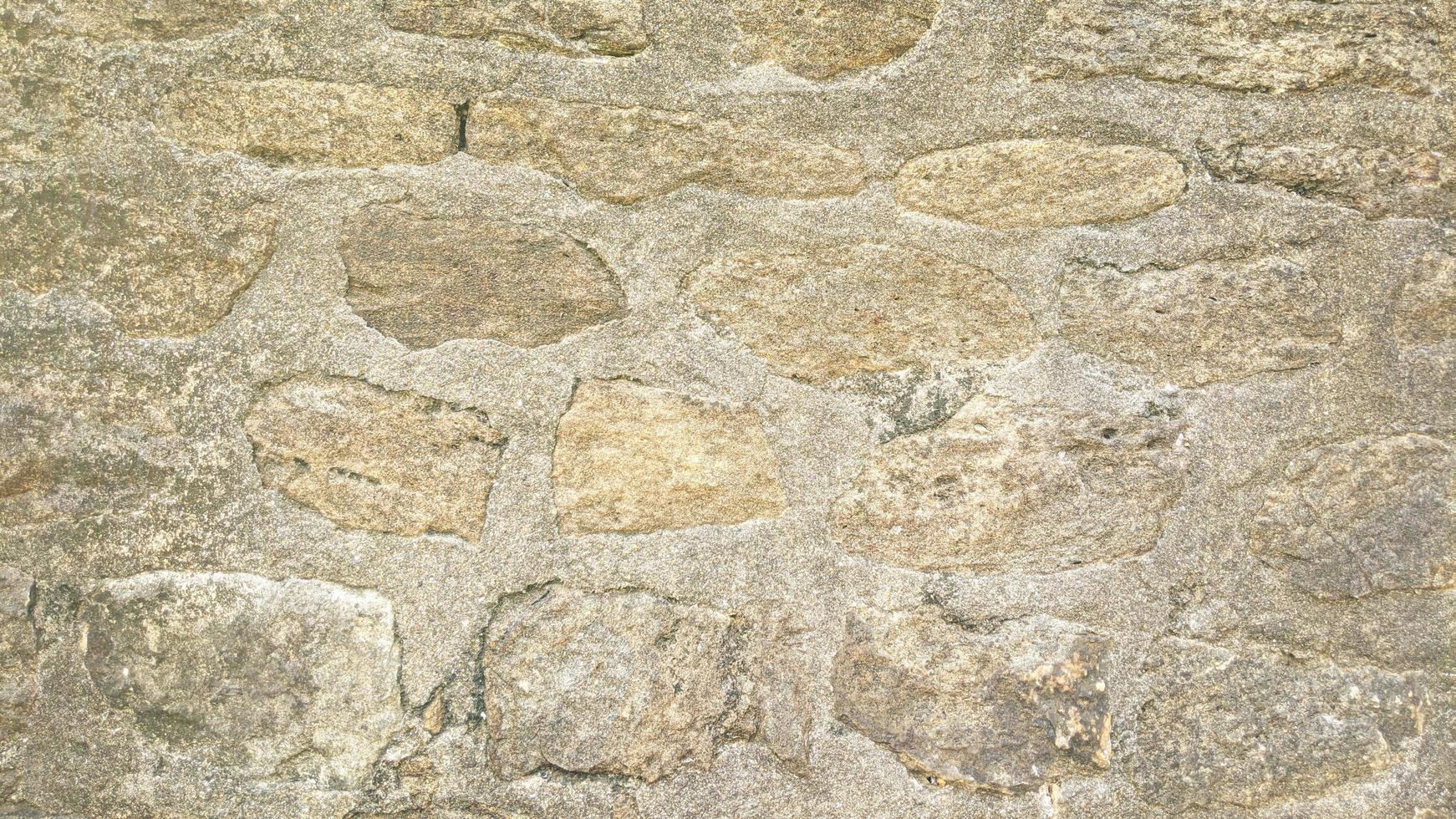 Fondo de textura de piedra de la pared vieja foto