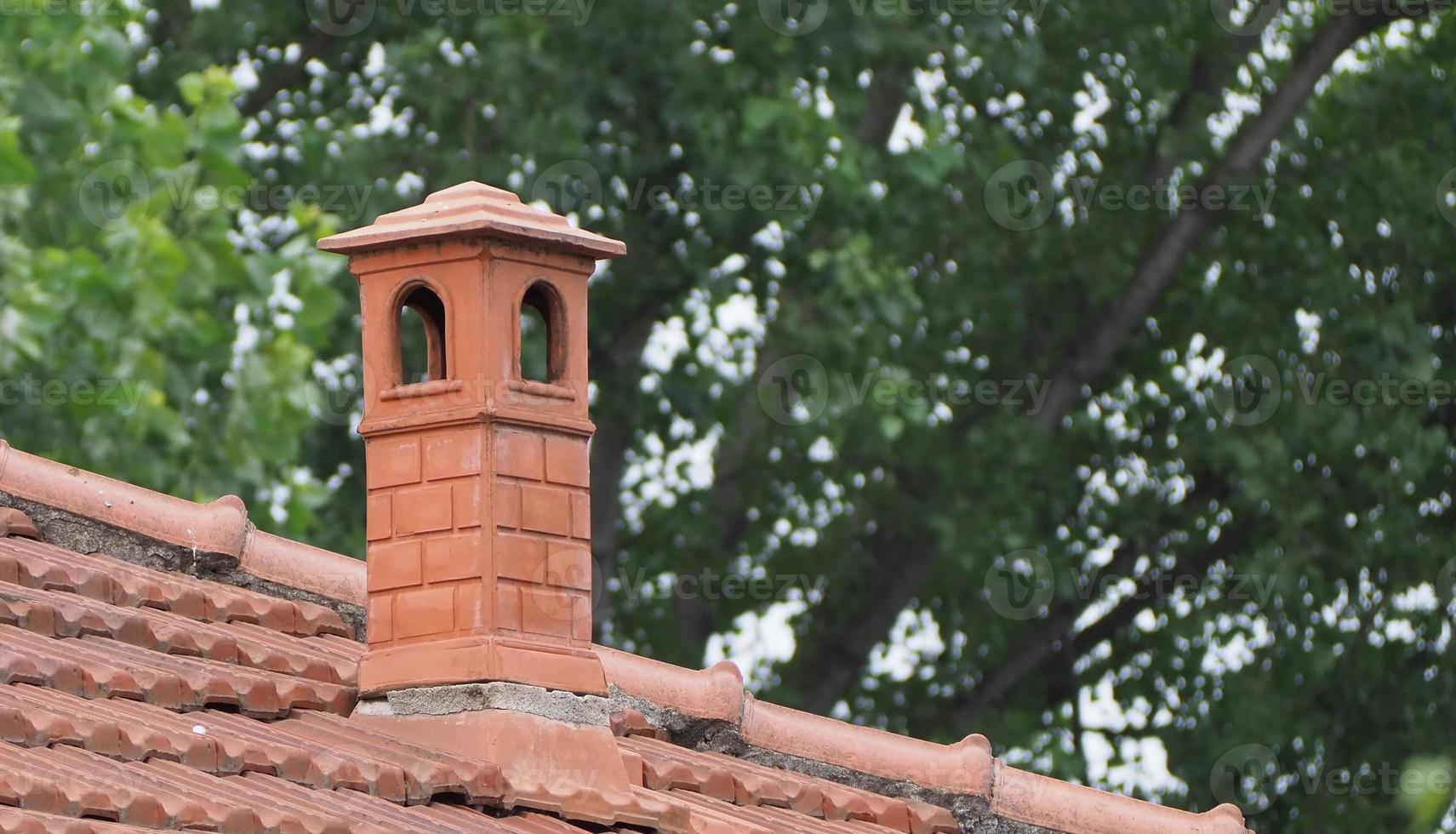 House roof with chimney photo