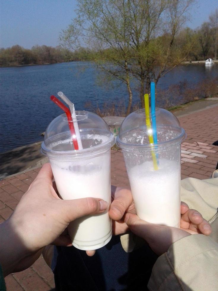 Milk cocktail in hand photo