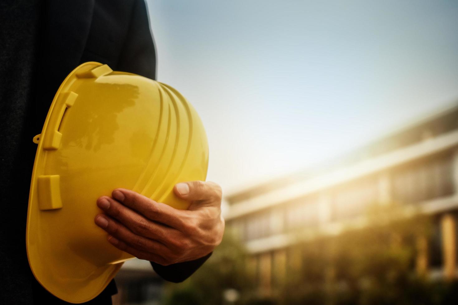 Worker Architecture Engineer hold hard hat helmet safety  for construction photo