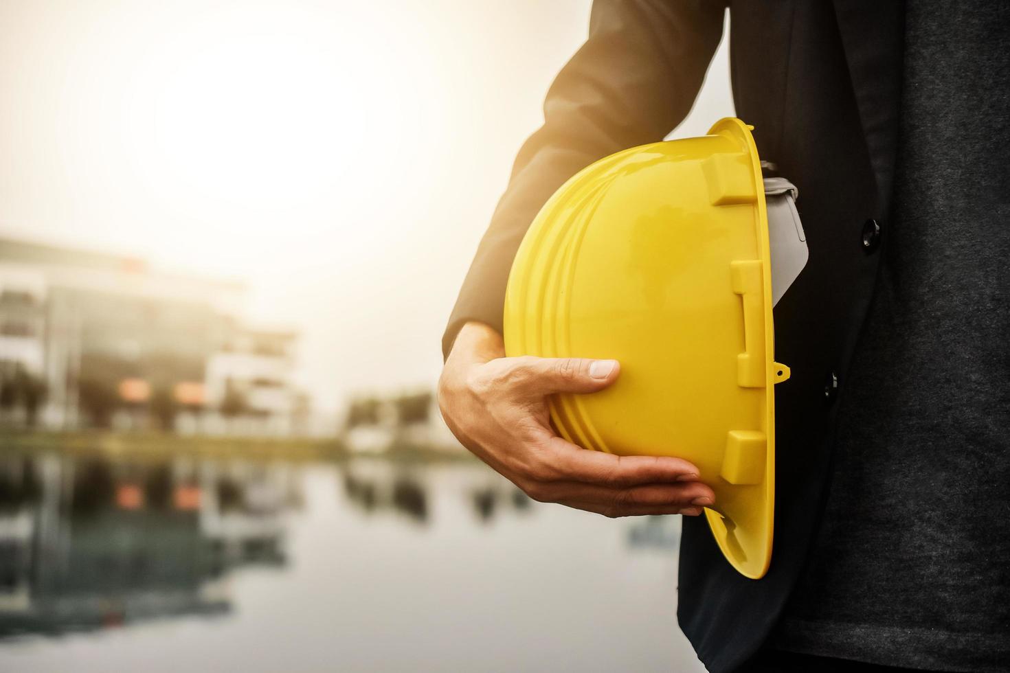 Worker Architecture Engineer hold hard hat helmet safety  for construction photo