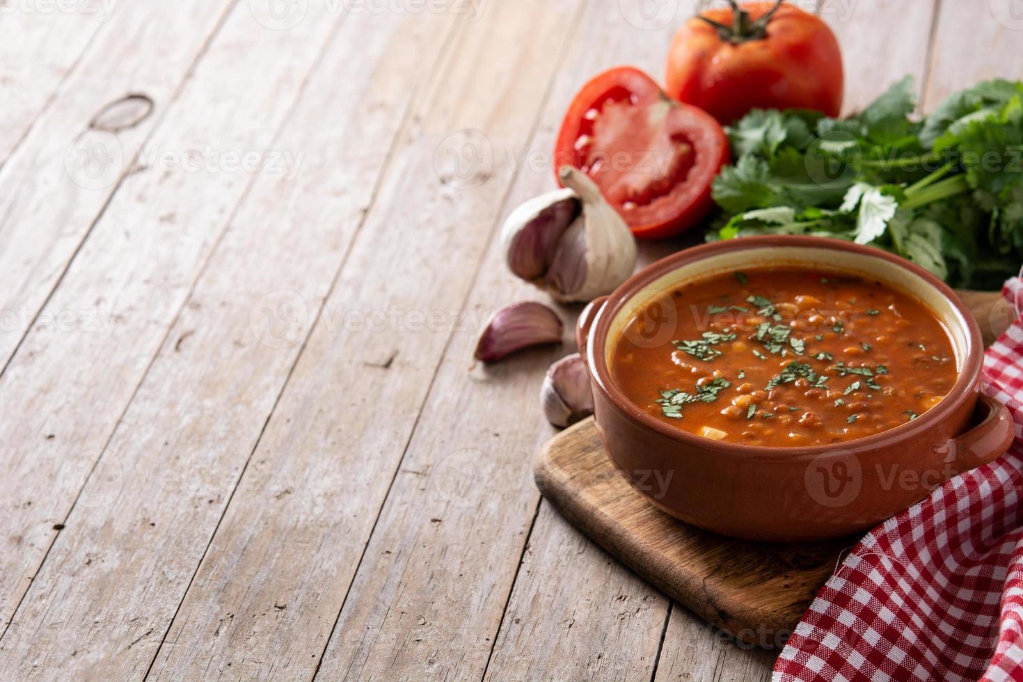 Red lentil soup in bowl photo