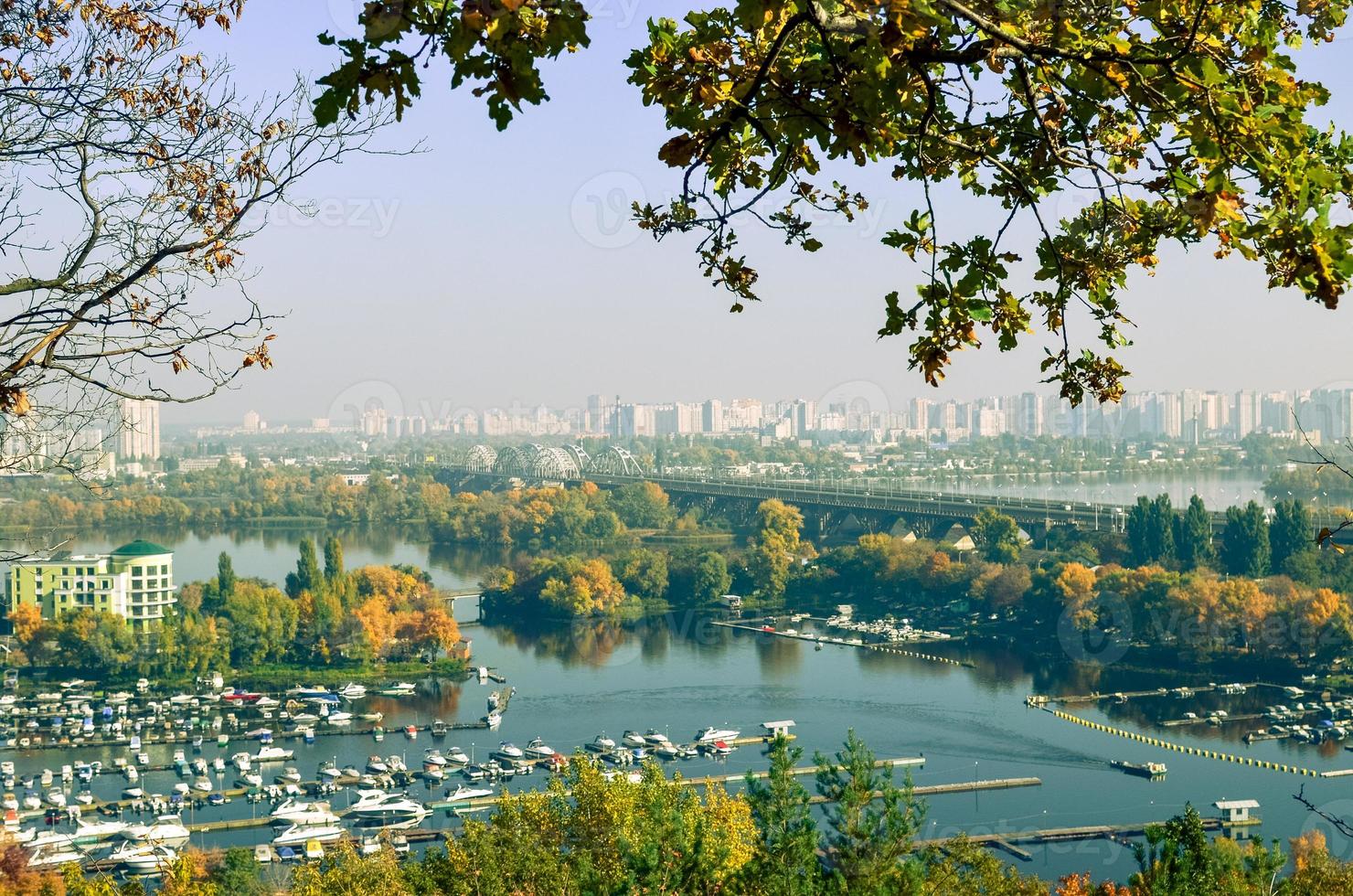 Panoramic view of district Podil and the Dnipro river in Kyiv at autumn photo