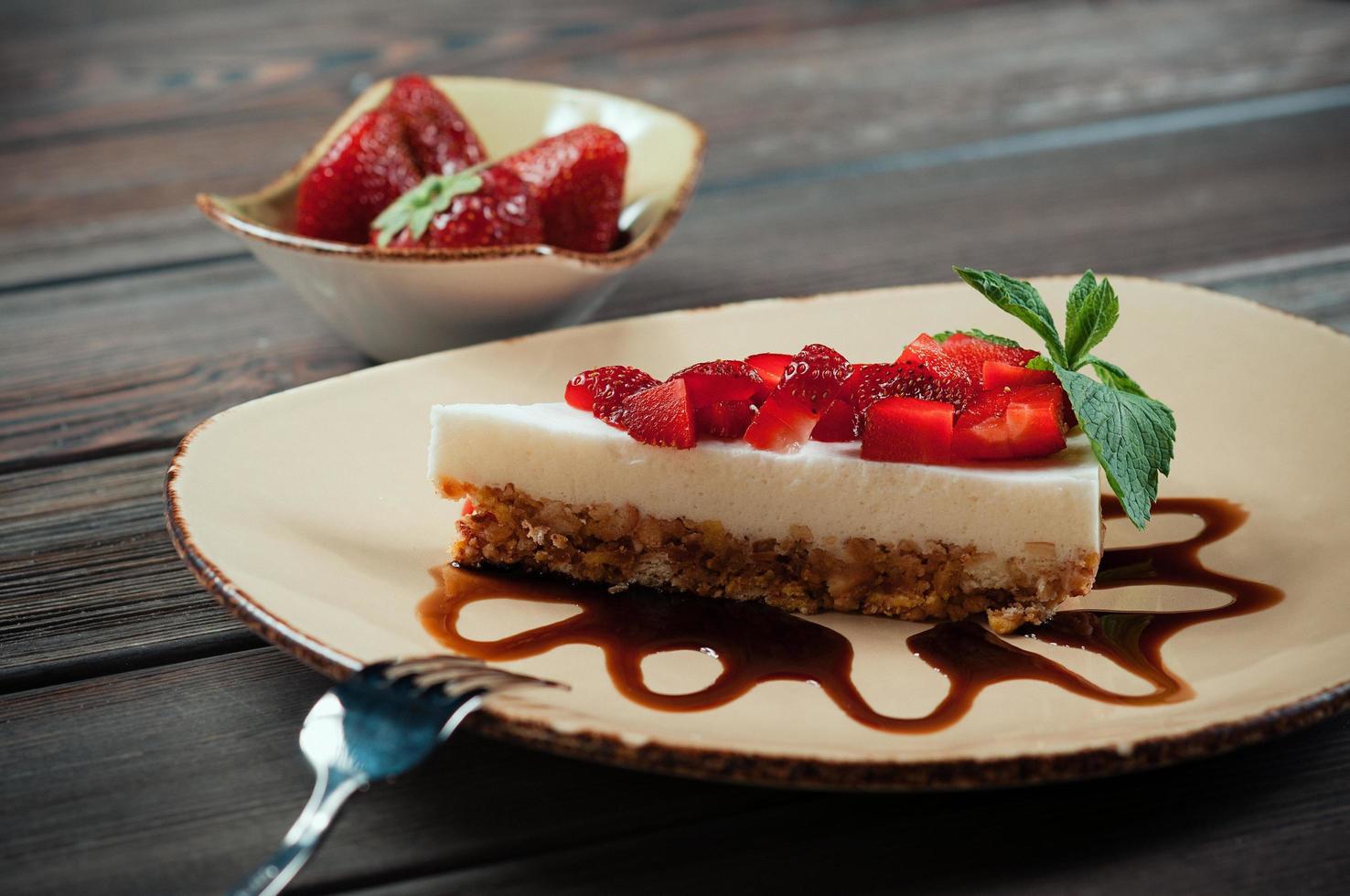 Slice of strawberry cake, selective focus photo