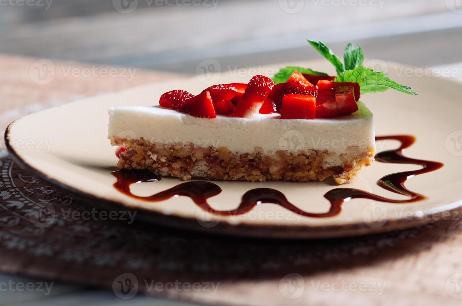 Slice of strawberry coconut cake, selective focus photo