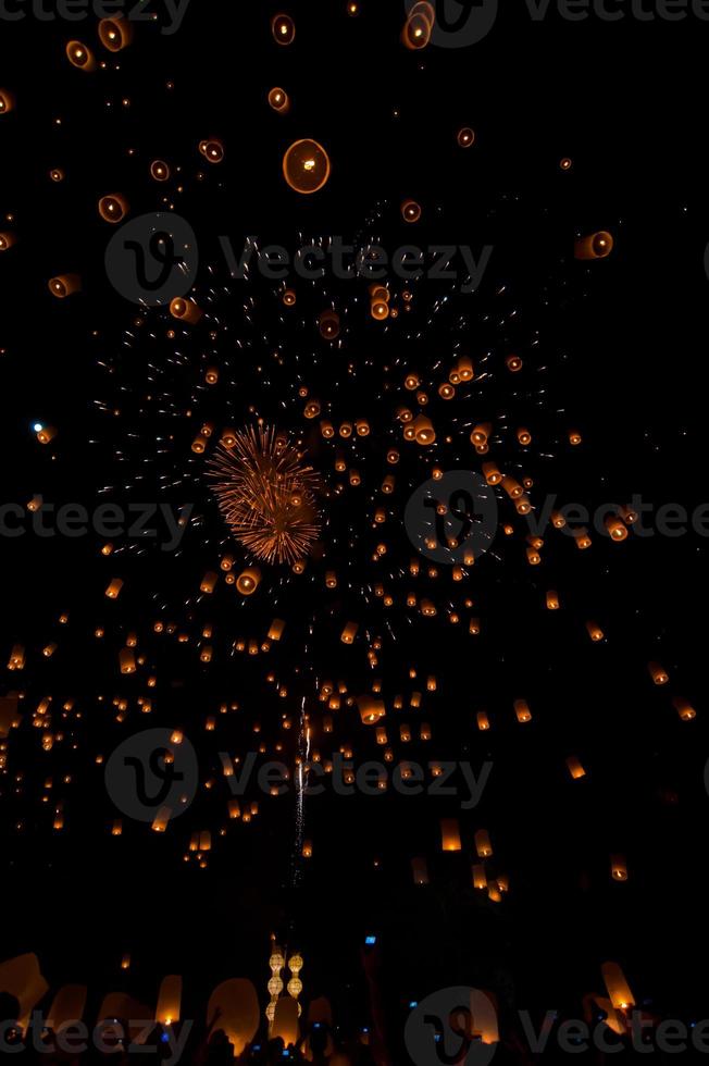 Floating lantern in Yee Peng festival Loy Krathong Buddhist floating lanterns to the Buddha in Sansai Thailand photo
