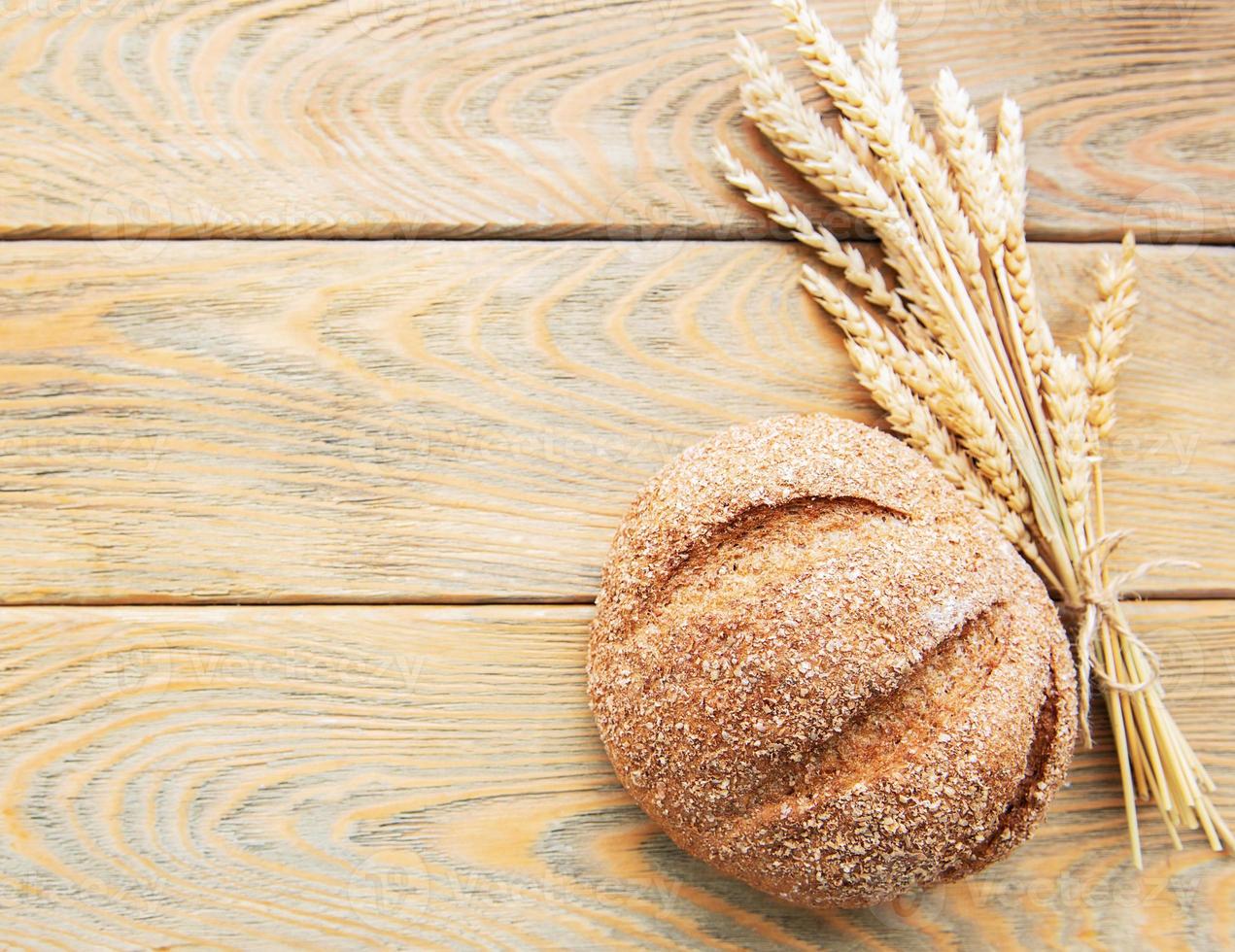 Bread with wheat ears photo