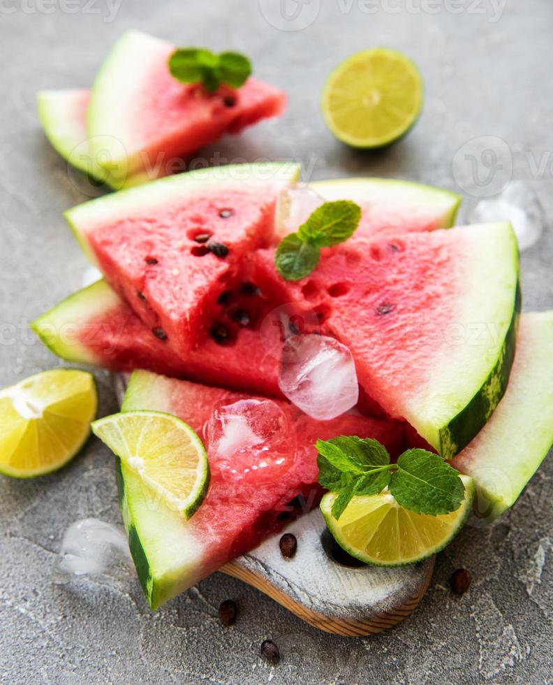 Watermelon  with limes and ice photo