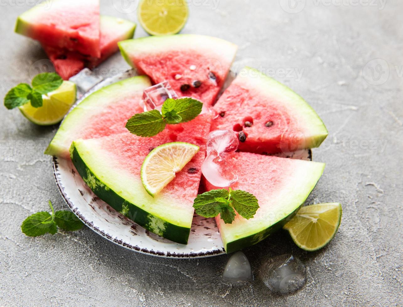 Watermelon with ice and lime photo