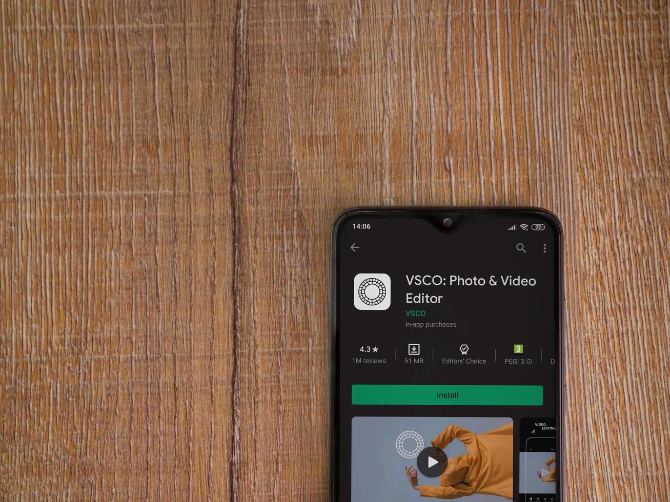 Vsco Photo And Video Editor App Play Store Page On The Display Of A Black Mobile Smartphone On Wooden Background 3703003 Stock Photo At Vecteezy