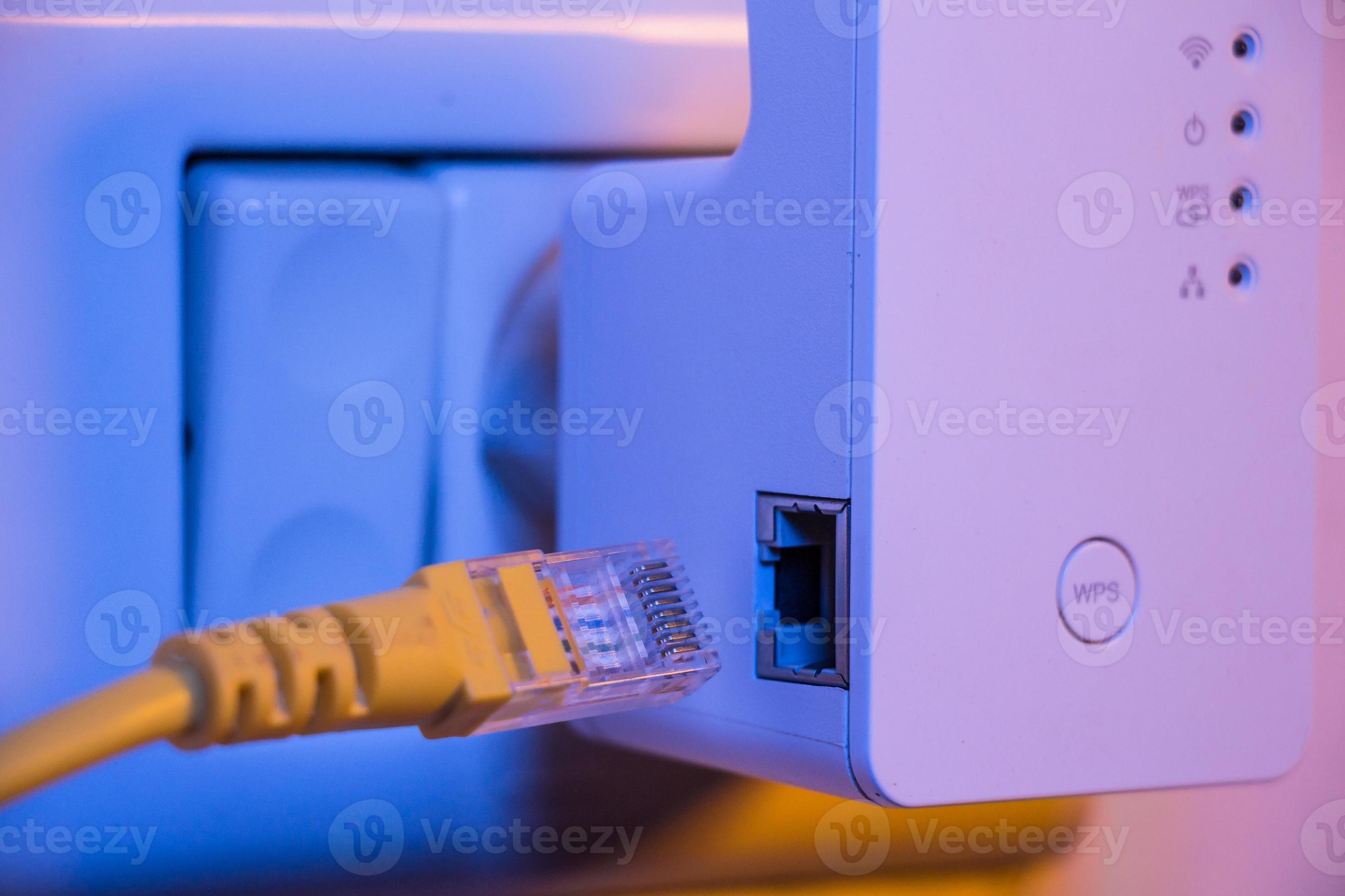 Insert cable into WiFi extender device which is in electrical