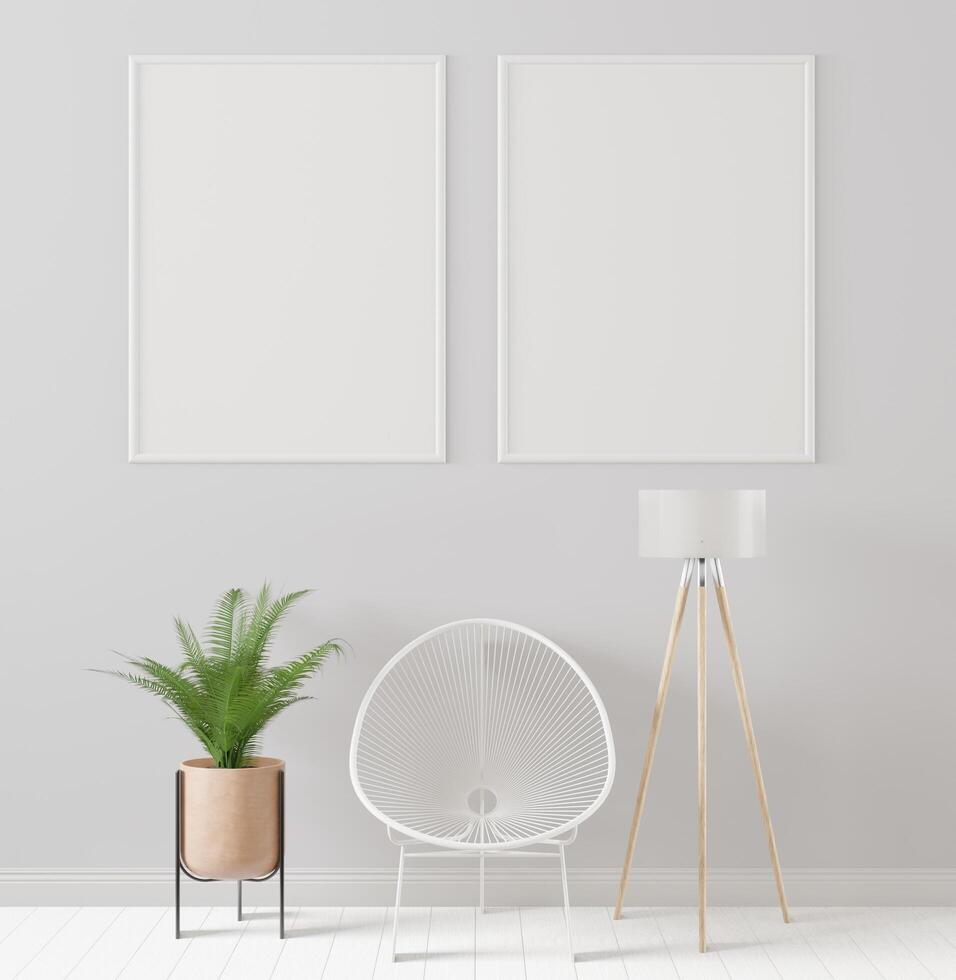 Living room decorated with chairs, Picture Frames and Small Plant Pots photo