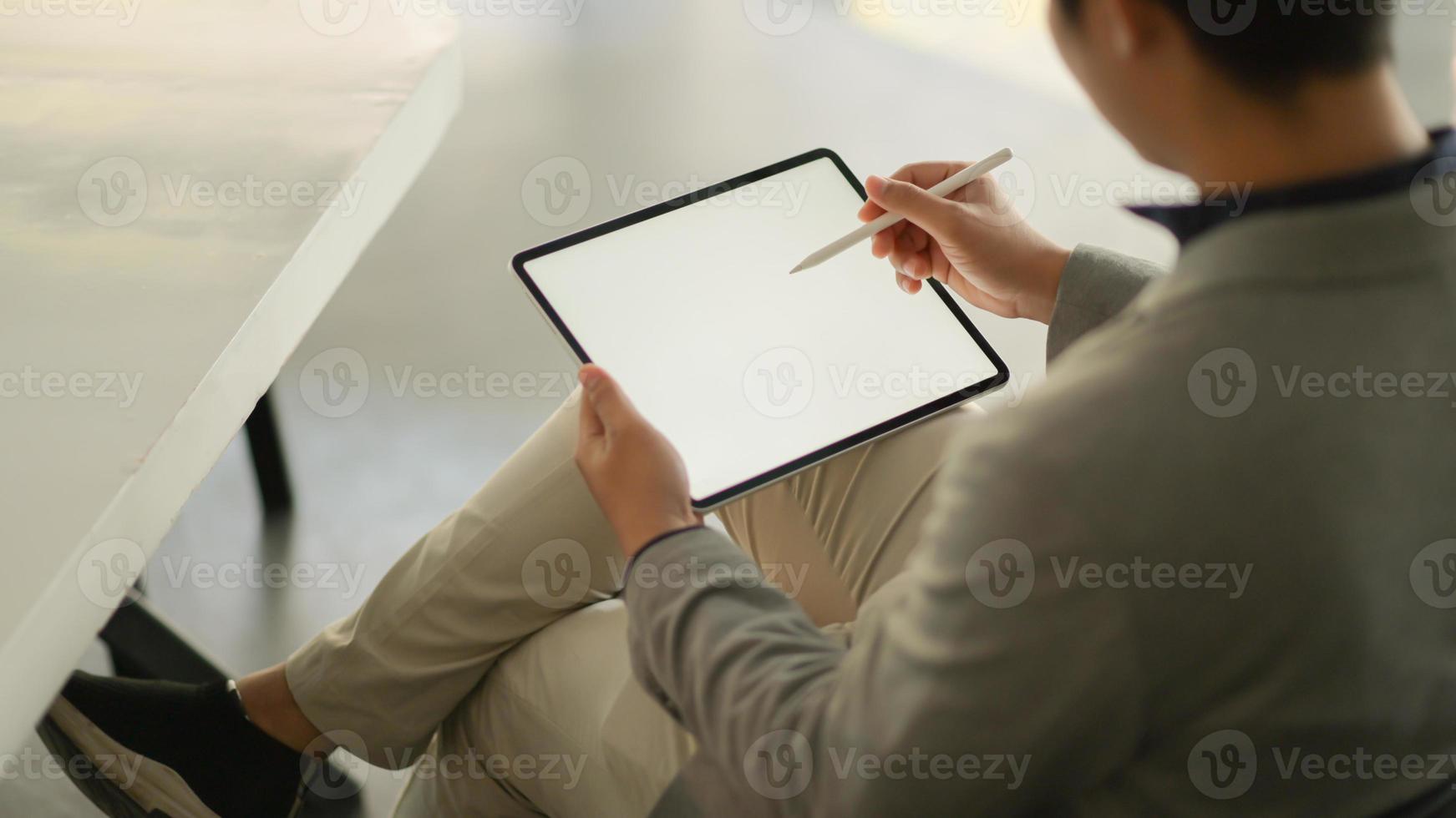 Business people feel comfortable using tablet blank screen. photo