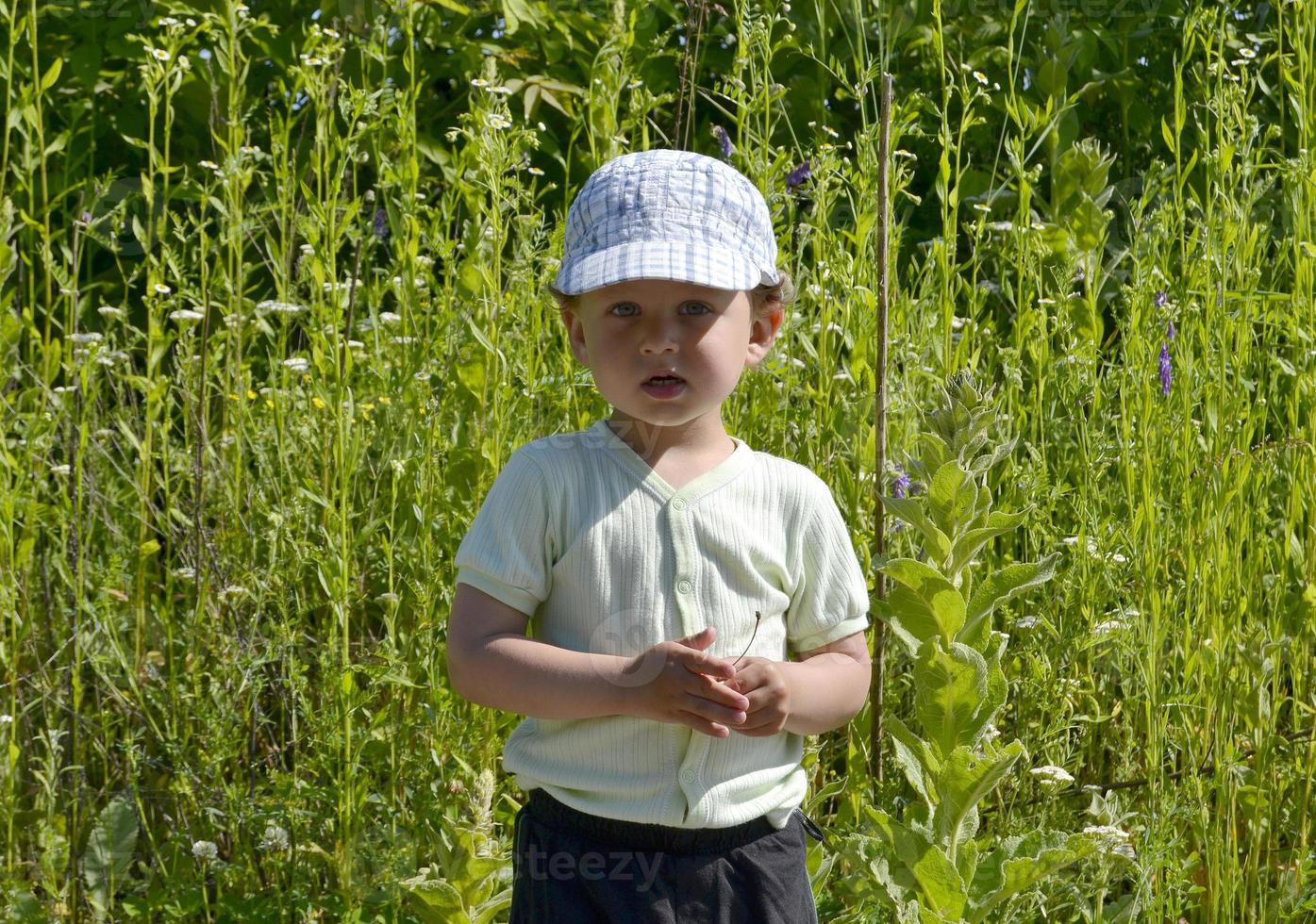 Beautiful baby boy with child face posing photographer photo