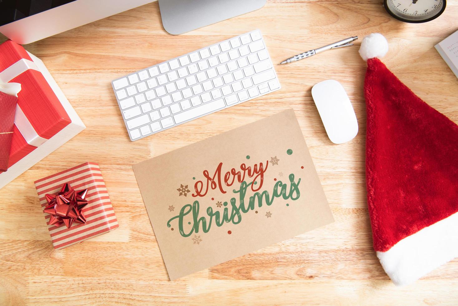 Happy new year holiday greeting paper card design mockup with decoration on wood table. photo