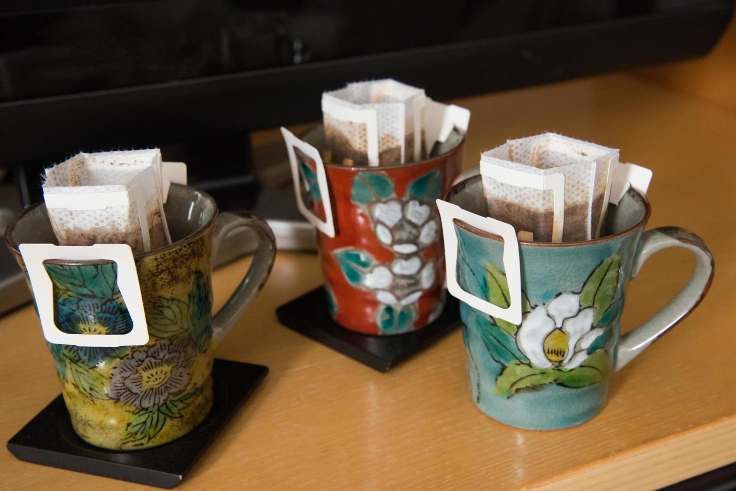Complimentary cups of tea in a Japanese hotel in Kanazawa. photo
