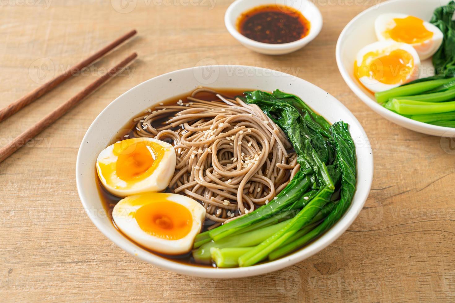 ramen noodles with egg - vegan or vegetarian food style photo