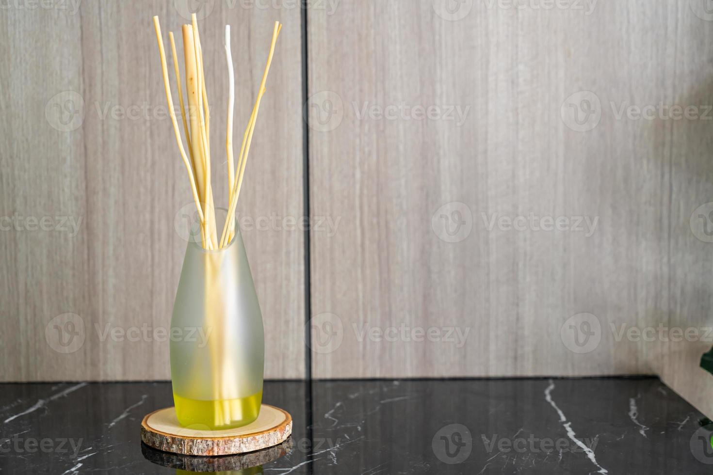 Aromatic reed freshener on table photo
