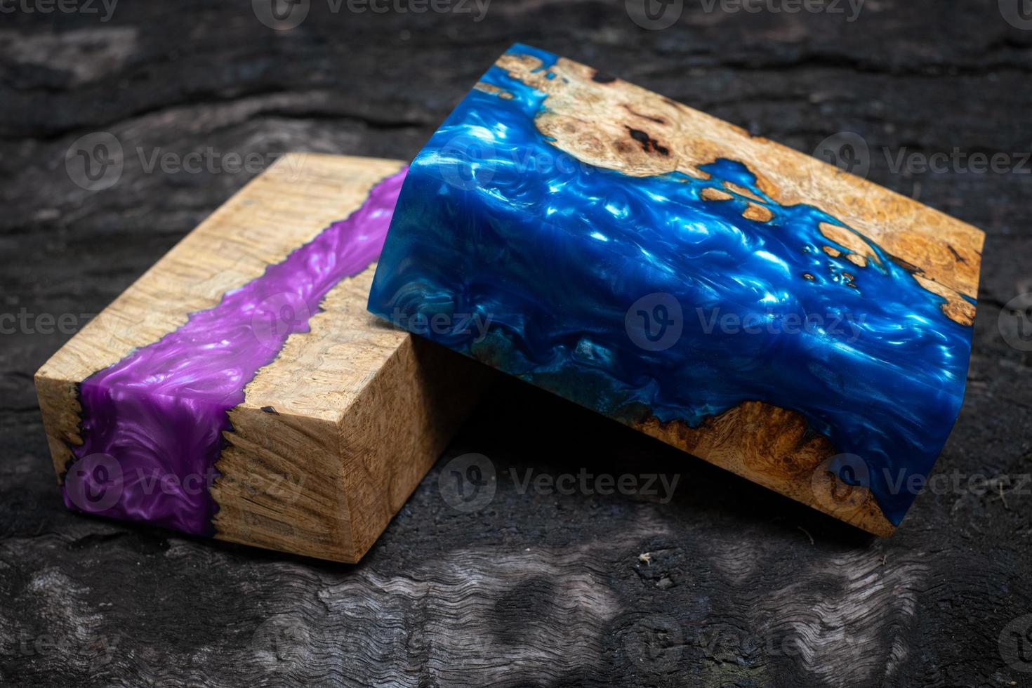 Casting epoxy resin maple burl wood on the table photo