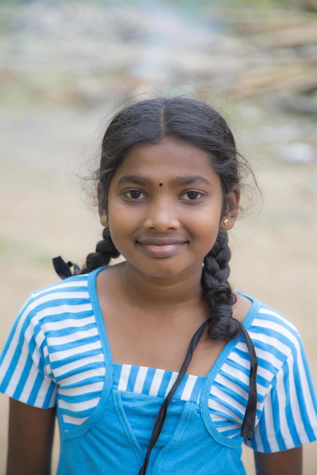 MATALE. SRI LANKA, JANUARY 27, 2014 - Unidentified schoolgirl at the street of Matale, Sri Lanka. At Sri Lanka Education is state funded and offered free of charge at all levels. photo