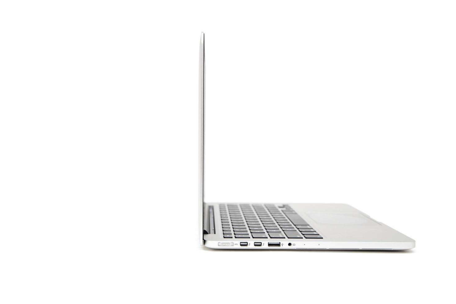 BELGRADE, SERBIA, MARCH 3, 2017 - MacBook computer isolated on white. The MacBook is a brand of notebook computers manufactured by Apple Inc. photo